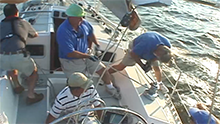 image of sailboat racing crew